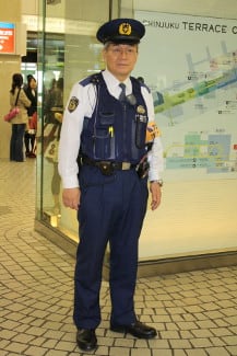 Tokyo Police Officer in Metro Station