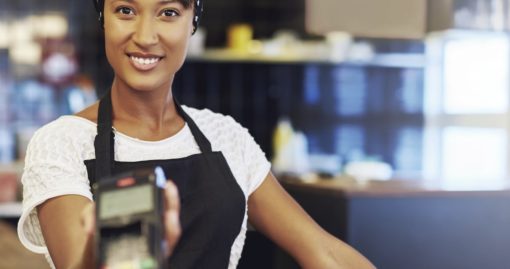 Woman With EMV Credit Card Reader