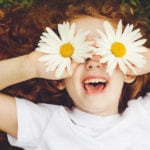 Child with daisy eyes.