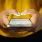 Woman's Hands Holding a Smartphone