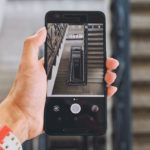 Smartphone screen with a photo of a staircase going down