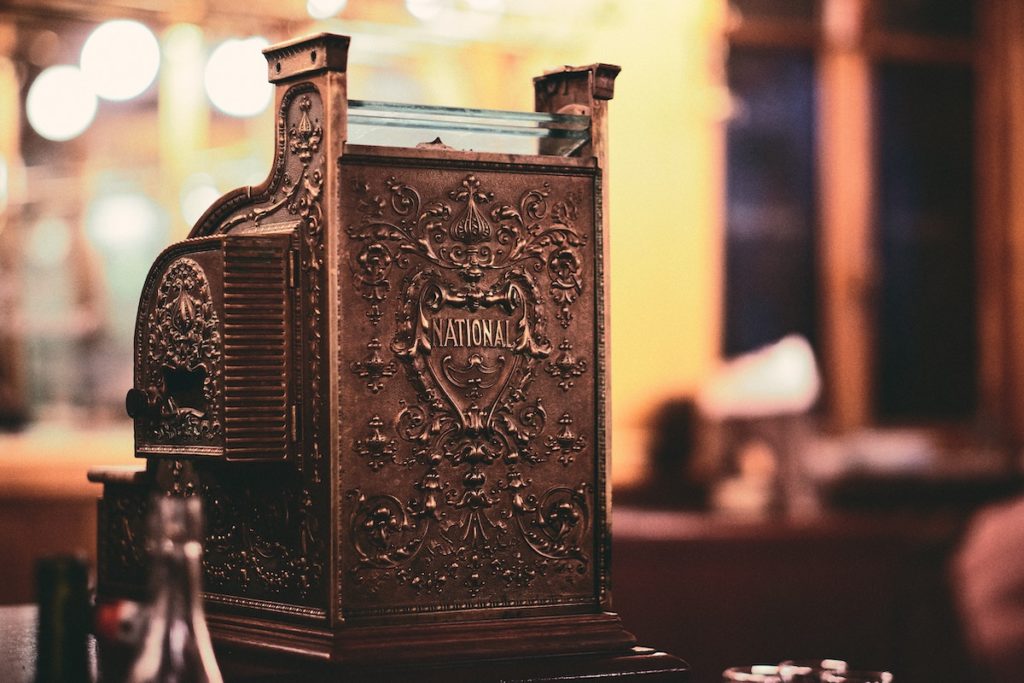 Classic cash register on a counter