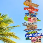 Signposts in a tropical scene