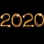 Sparkler light trail that spells out "2020"