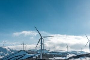 Wind turbines on snowy hills