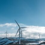 Wind turbines on snowy hills